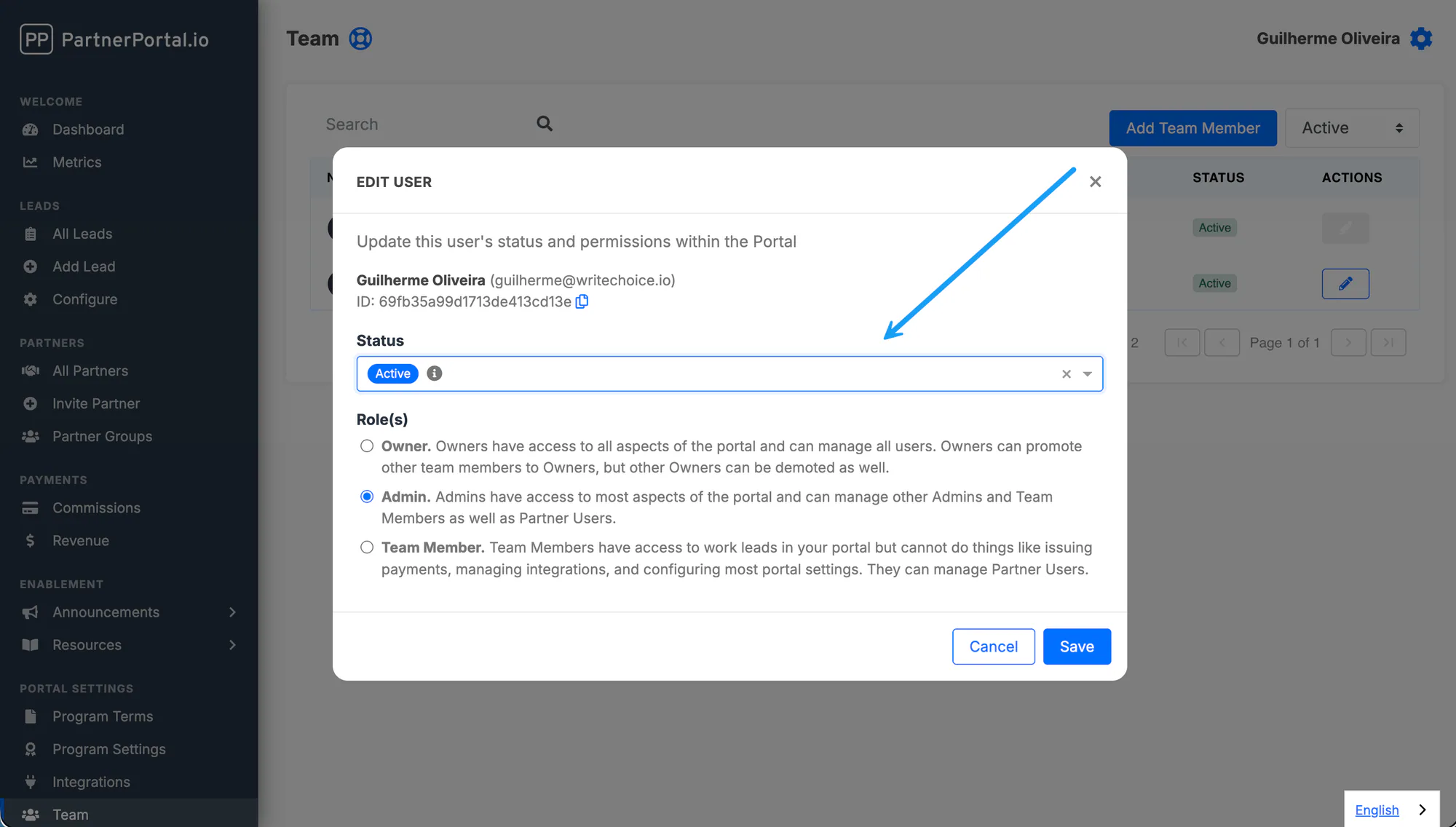 The status dropdown in a team member record with Suspended selected.
